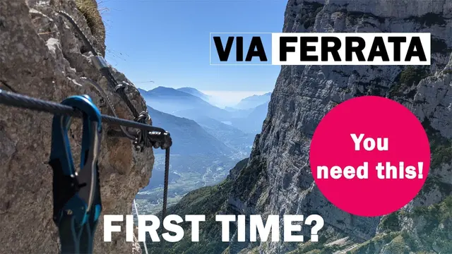 Via ferrata beginner guide thumbnail showing a climber by the safety cable